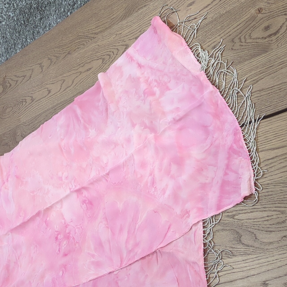 Long shawl wrap with beads.